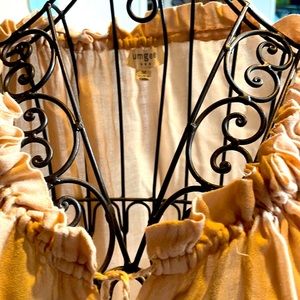 Thin long sleeve see through blouse.